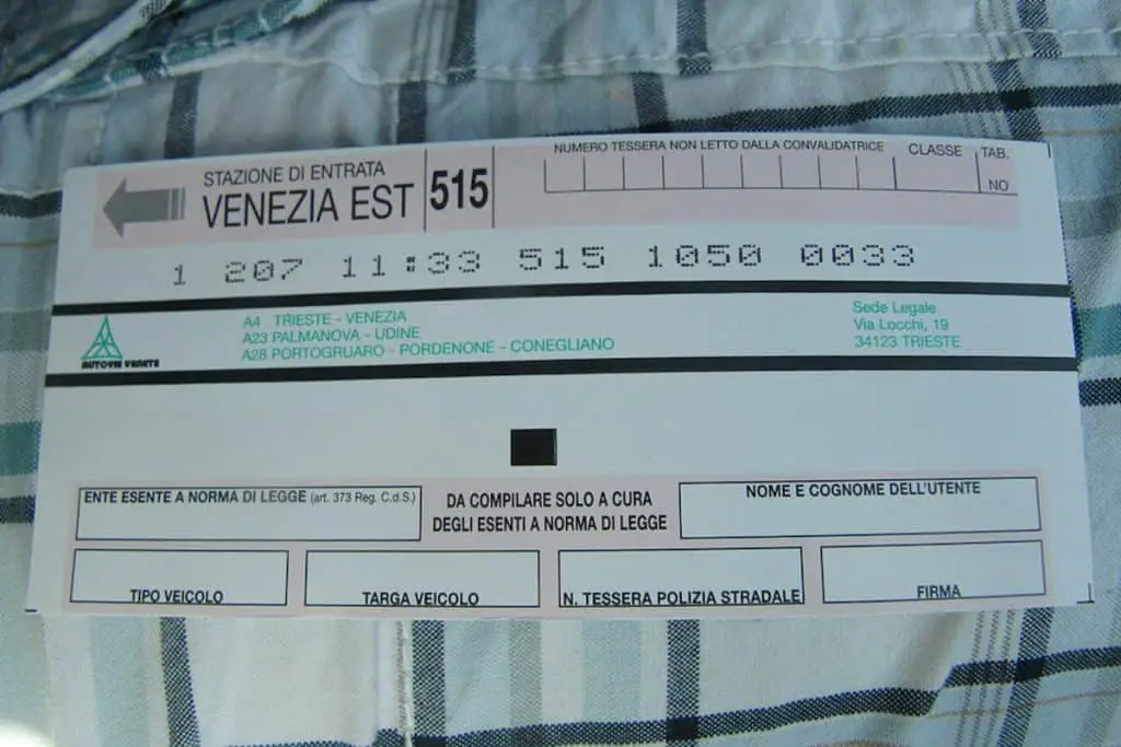White ticket with two black horizontal stripes 